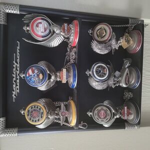 Lot of 6 Harley Davidson franklin mint pocket watches and stand